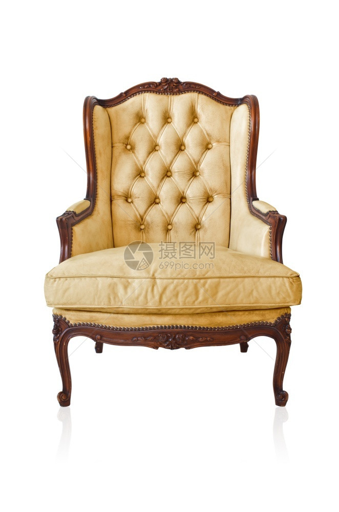 白色背景沙发上孤立的黄色古董风格沙发自然覆盖雕刻图片