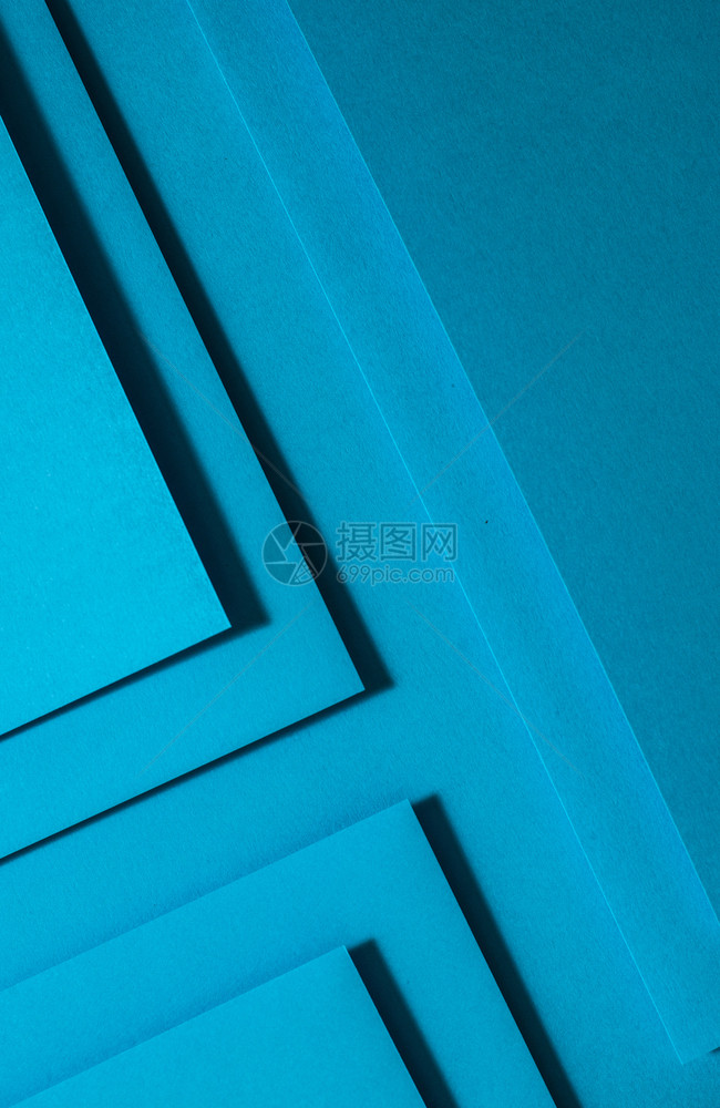 抽象的丰富多彩复古蓝纸材料设计几何单色形状壁纸设计背景图片