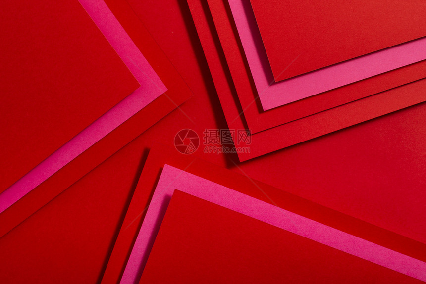 艺术工形象的红纸材料设计几何单色形状壁纸设计背景图片