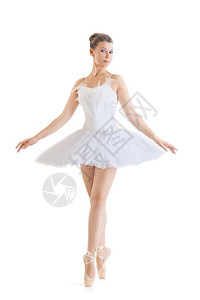 摆姿势白色背景的古典芭蕾舞裙中的美丽芭蕾舞女肖像士图片