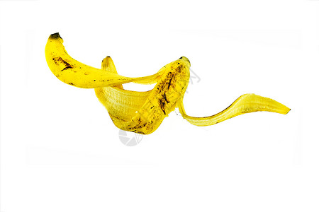 香蕉皮被漂浮在空气隔离区白色背景中落下事故饮食图片