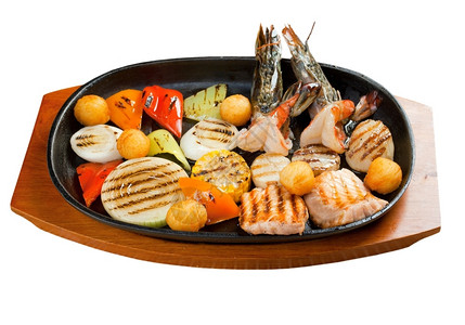 碗新鲜的晚餐含有蔬菜青料的海鲜图片