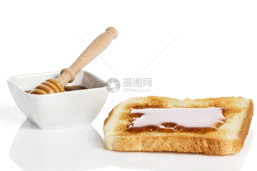 糖蜂蜜吐司罐勺吐司白色背景健康甜的图片
