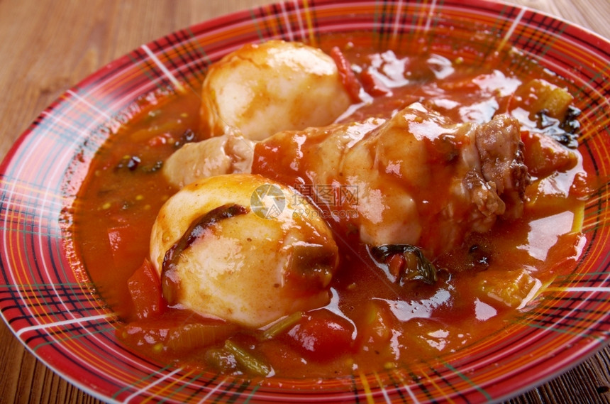 辣椒红色的酱DoroWat埃塞俄比亚红鸡肉炖瓦特DoroWat是种此类炖菜之一由鸡蛋和有时煮得硬的鸡蛋制成图片