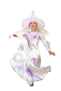 在万圣节或嘉年华派对上白Costum的美丽小女孩与魔杖共舞诡计跳一种图片