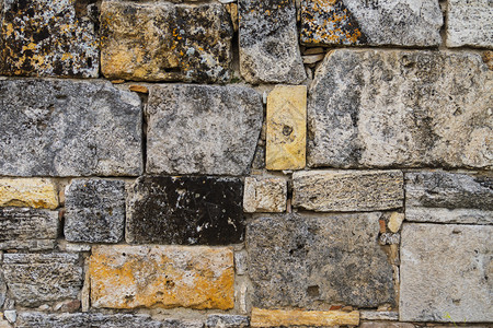 花岗岩由不同类型石块制成的墙质灰色有感图片