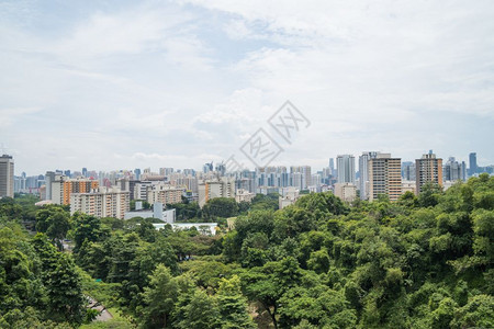 高的新加坡城市大楼建筑在公园的云丛中天空清晴区住宅图片