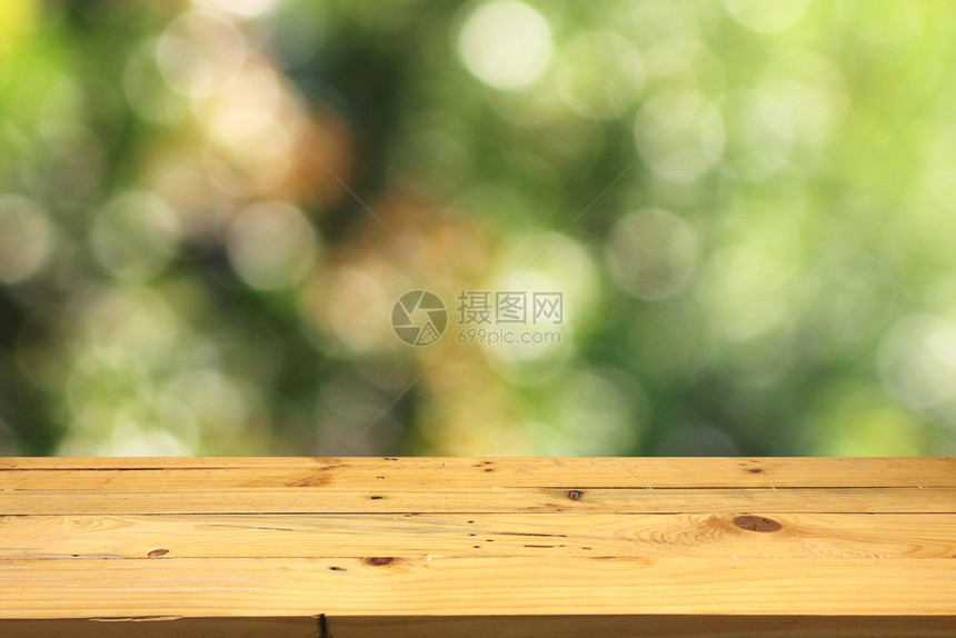 抽象的背景明亮木头将产品放置在bokeh背景的木质布丁绿色颜美丽的背景布基图片