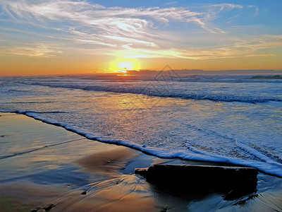 荷兰西海岸日落美丽在荷兰西海岸大洋葡萄牙海滩图片