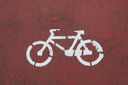 环境路线途径为自行车司机提供红色车道城市路背景图片