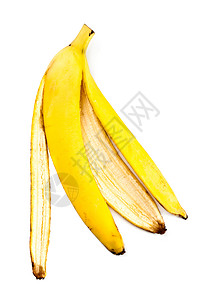 热带躺着外壳白色背景上孤立的香蕉皮图片
