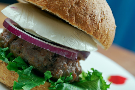 希腊语油炸终极汉堡希腊风格的美味牛肉汉堡酸奶图片
