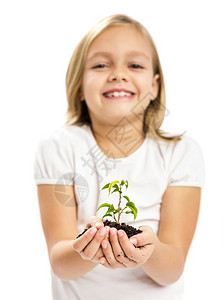 双手捧着植物的小女孩图片