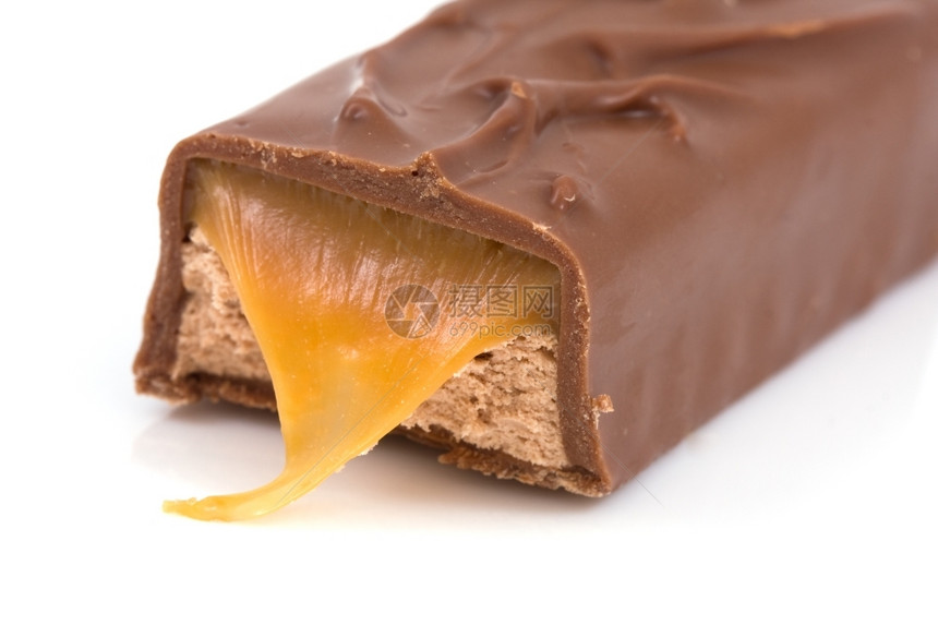坚果巧克力有奶油白纸上隔绝棕色的健康图片