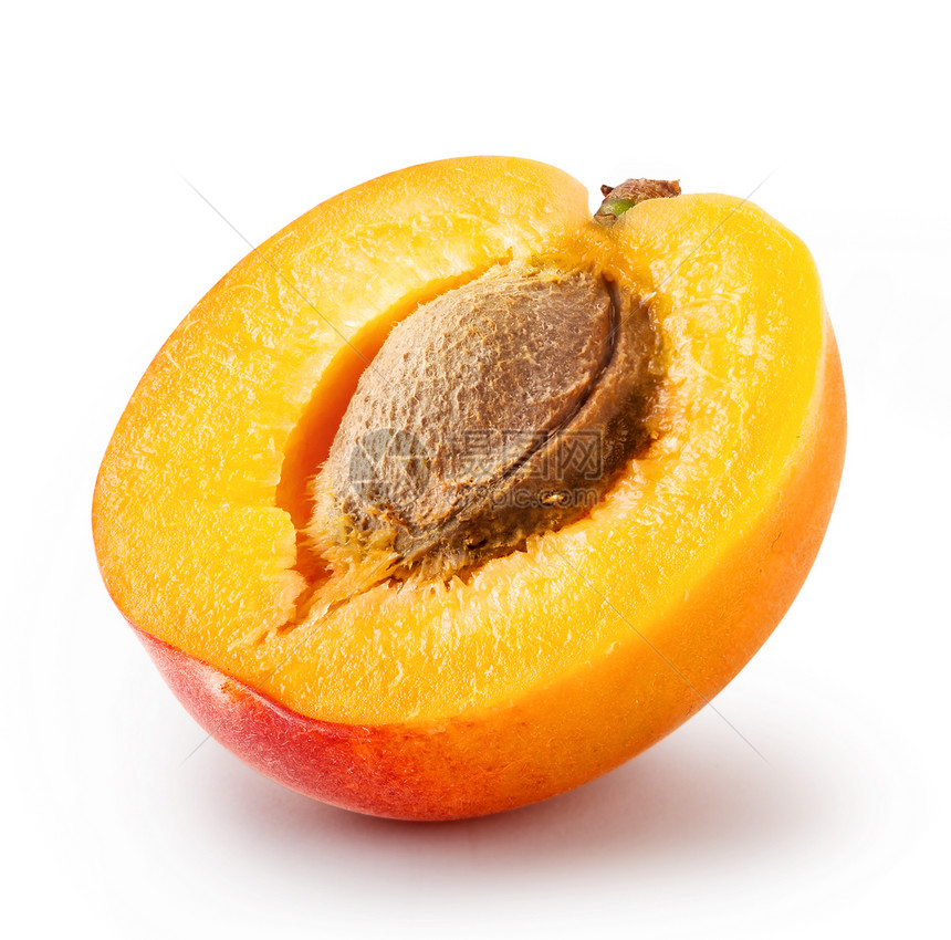 切白底骨片断的杏子切有骨头的杏子茶点素食主义者白色的图片