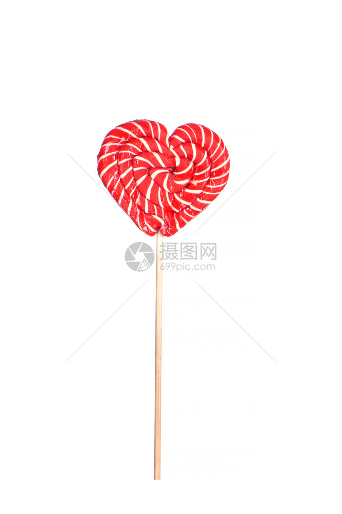 红棒糖放在一个心脏形状的棒上在白色绝缘可口爱礼物图片
