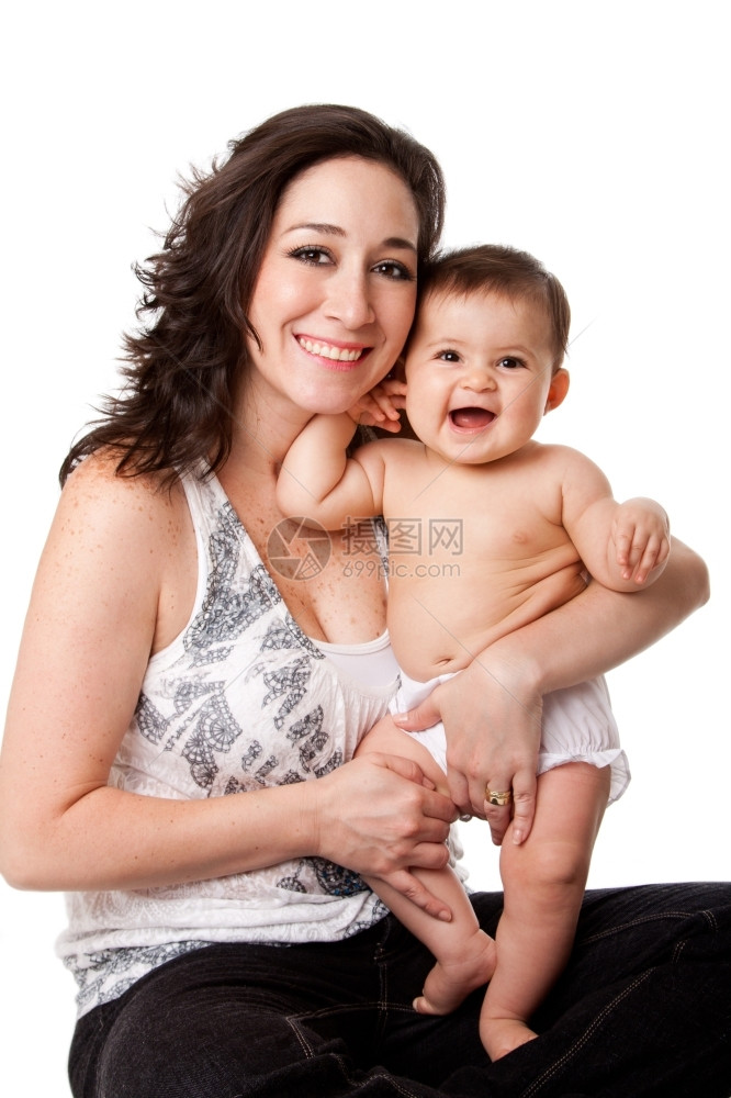 拉丁裔哈基又坐着美丽的家庭幸福母亲和笑着婴儿在大腿上与世隔绝图片