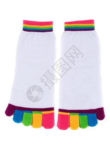 颜色工艺有条纹的一对白袜子和有色手指的白袜子图片