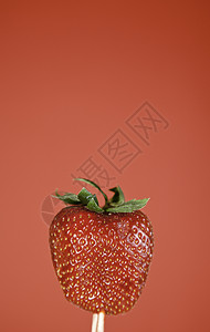 美味的种子红底草莓甜多汁的草莓细节食物健康的生活饮食皮肤图片