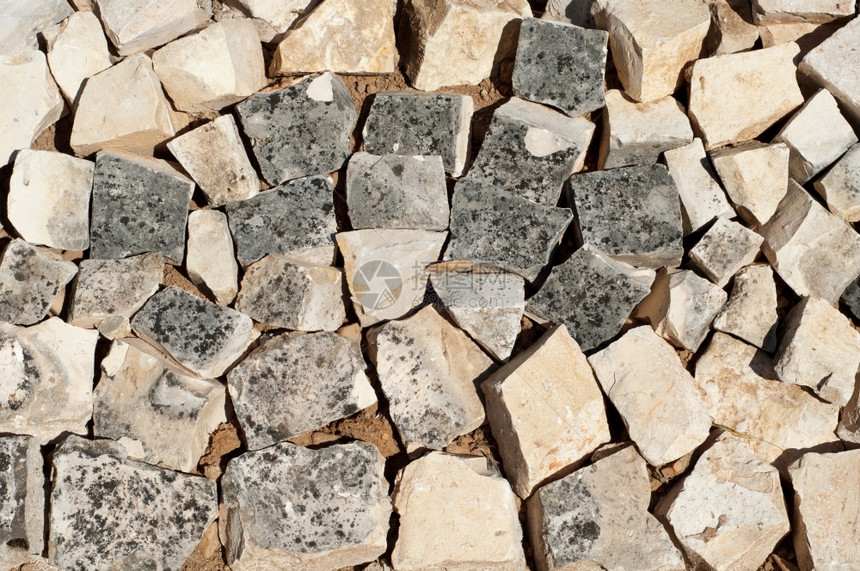 土壤防止山崩的石块路障可用作质地或背景材料预防灰色的图片