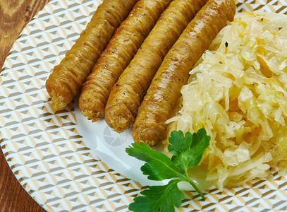 盘子Bulviniaivedarai立陶宛香肠各种或用混合肉和饭的填料充肠子或者早餐图片