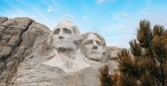 罗斯福总统雕刻南达科他州拉什莫尔山纪念碑夏日天落联合的雕塑背景