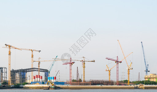 工业的商项目建筑施工中的起重机使用建造大型筑的工作图片