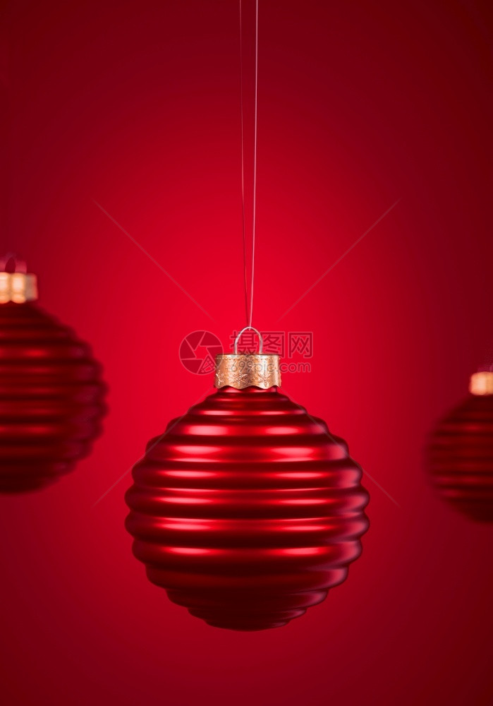 绞刑横向肋骨的圣诞球挂在勃根迪红色背景上圣诞装饰品节庆气氛概念选择焦点肖像定向专注喜庆的圣诞节图片