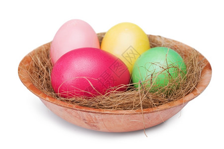 克罗波托夫庆典杂色多复活节鸡蛋在白背景上孤立的巢中图片