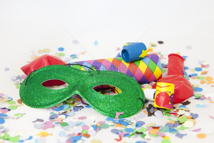面具派对带条纹和面罩的多彩嘉年华背景狂欢图片