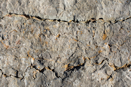 采石场自然岩或表面作为背景纹理坚硬的卵石图片