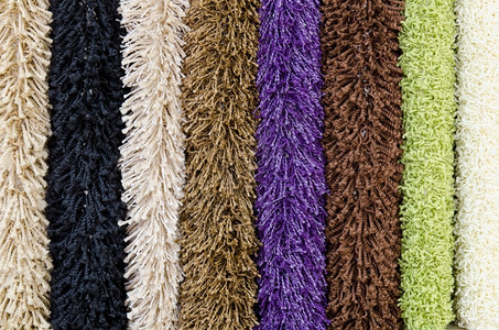 条纹紫色芥末不同彩的人工毛地毯样本闭合式图片