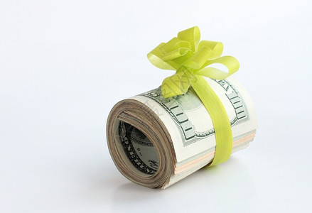 一种金融的美元钞票有绿色彩带作为赠金礼物图片