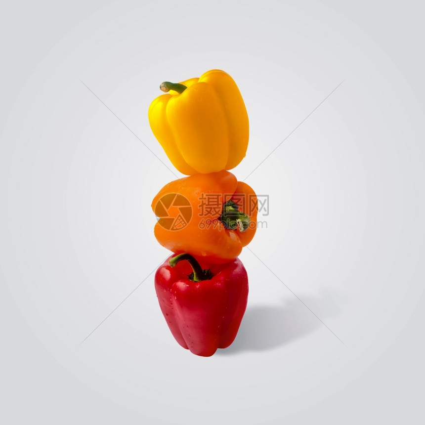 成熟黄色的灰背景红辣椒塔PeppersPaprika饮食图片