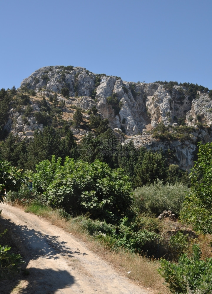 希腊科斯岛Zia山村农公路希腊科斯岛绿色形成草地图片