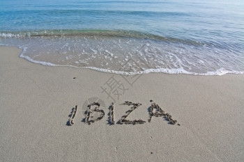 伊比沙岛海滩柔软的旅行在西班牙巴利阿里群岛的伊比萨Ibiza背景