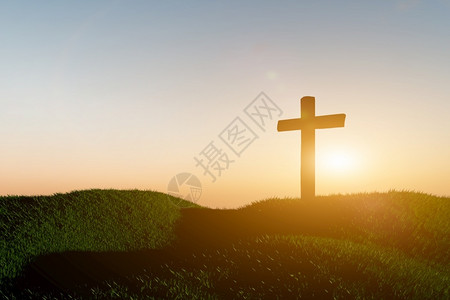 象征崇拜JesusChrist的日落背景下的天主教救恩图片