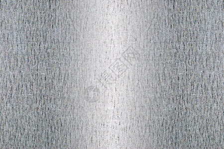 拉丝抽象的铝具有光反射铁板背景上的线条图案图片