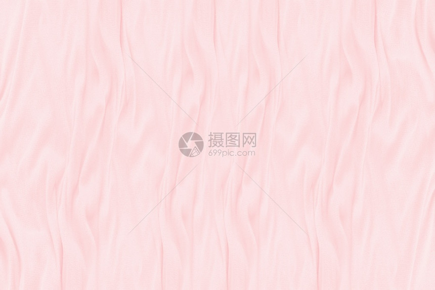 抽象的质地海浪平滑优雅的粉色丝绸纹理可用于背景图片