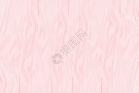 抽象的质地海浪平滑优雅的粉色丝绸纹理可用于背景图片