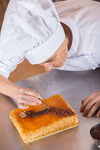 装饰蛋糕和奶油的点厨师餐厅精加工酒店图片