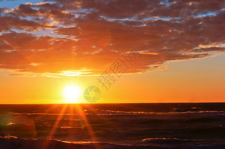 海上日落浪中的出上落阳光旅行颜色图片