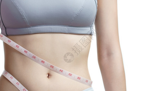 女人用胶带量度腰部胖的围测量图片