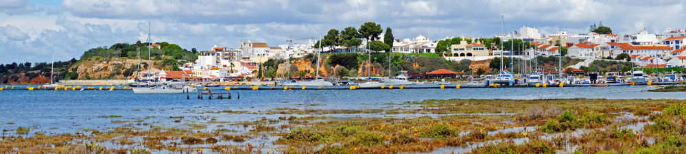 日落自然来葡萄牙阿尔加夫港的沃支撑图片