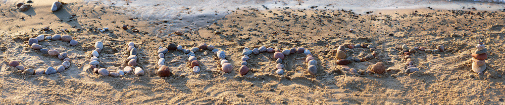 季节在沙滩上说夏日石头海沙夏天海石的字母松弛旅行图片
