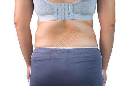 锻炼观察亚洲胖妇女的后视力在白色背景上被超重孤立女脂肪腹部肥胖症和保健概念不良皮肤背景图片