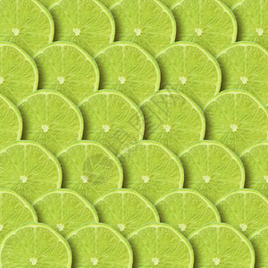 绿色背景含石灰片柑橘类水果切生的素食主义者图片