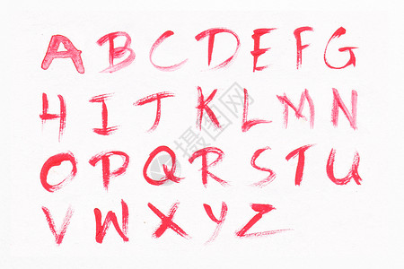 白纸背景上红色水彩的字母AZ手写质地降低溅图片