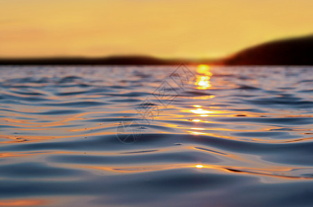 水地平线俄罗斯海上日落岸出上落图片