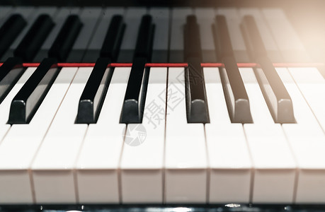 古典声音经钢琴键盘以温暖光亮和有选择焦点音乐器概念为主象牙图片